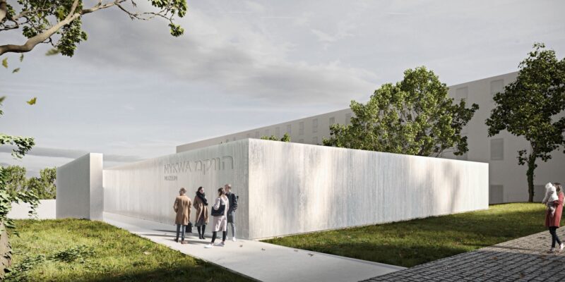 Odkryte podczas badań archeologicznych drewniane relikty XVIII-wiecznej mykwy żydowskiej w Oświęcimiu – widok na zachowaną konstrukcję łaźni rytualnej w wykopie ziemnym, z widocznymi drewnianymi ścianami, schodkami i elementami niecki.